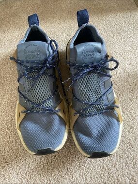 Blue adidas EQT running shoes